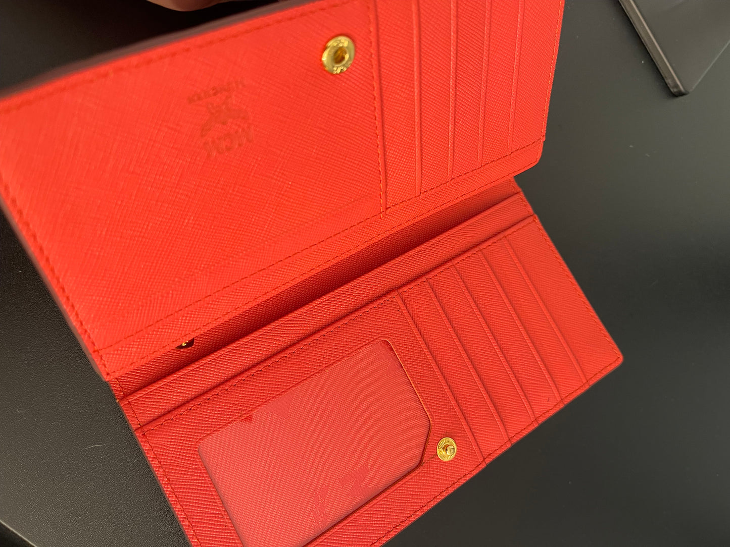 Pre-Owned MCM Orange Embossed Bifold Wallet