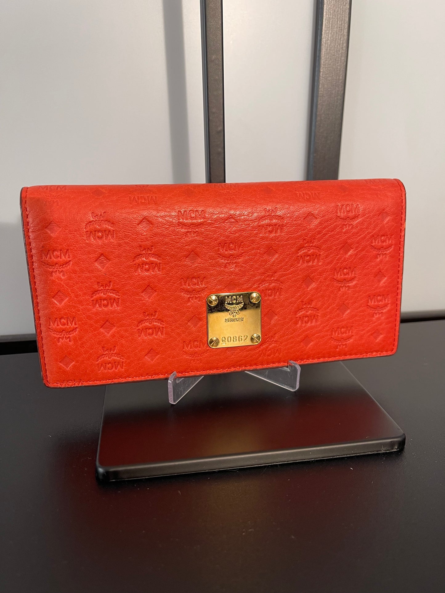 Pre-Owned MCM Orange Embossed Bifold Wallet