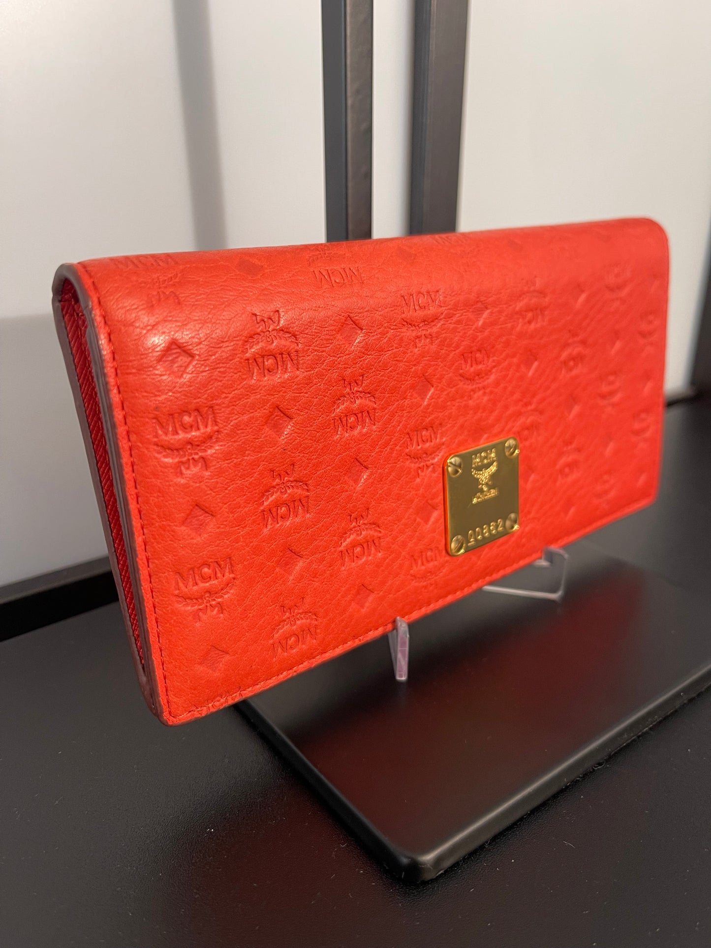 Pre-Owned MCM Orange Embossed Bifold Wallet
