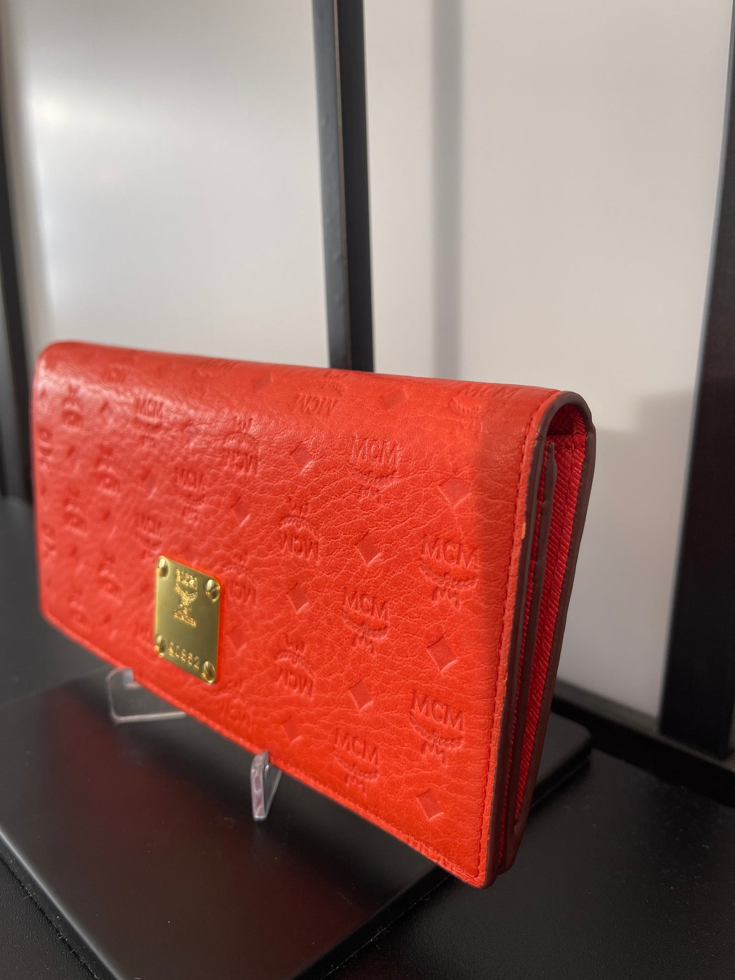 Pre-Owned MCM Orange Embossed Bifold Wallet