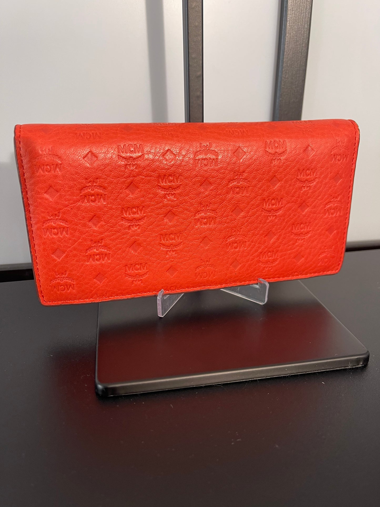 Pre-Owned MCM Orange Embossed Bifold Wallet